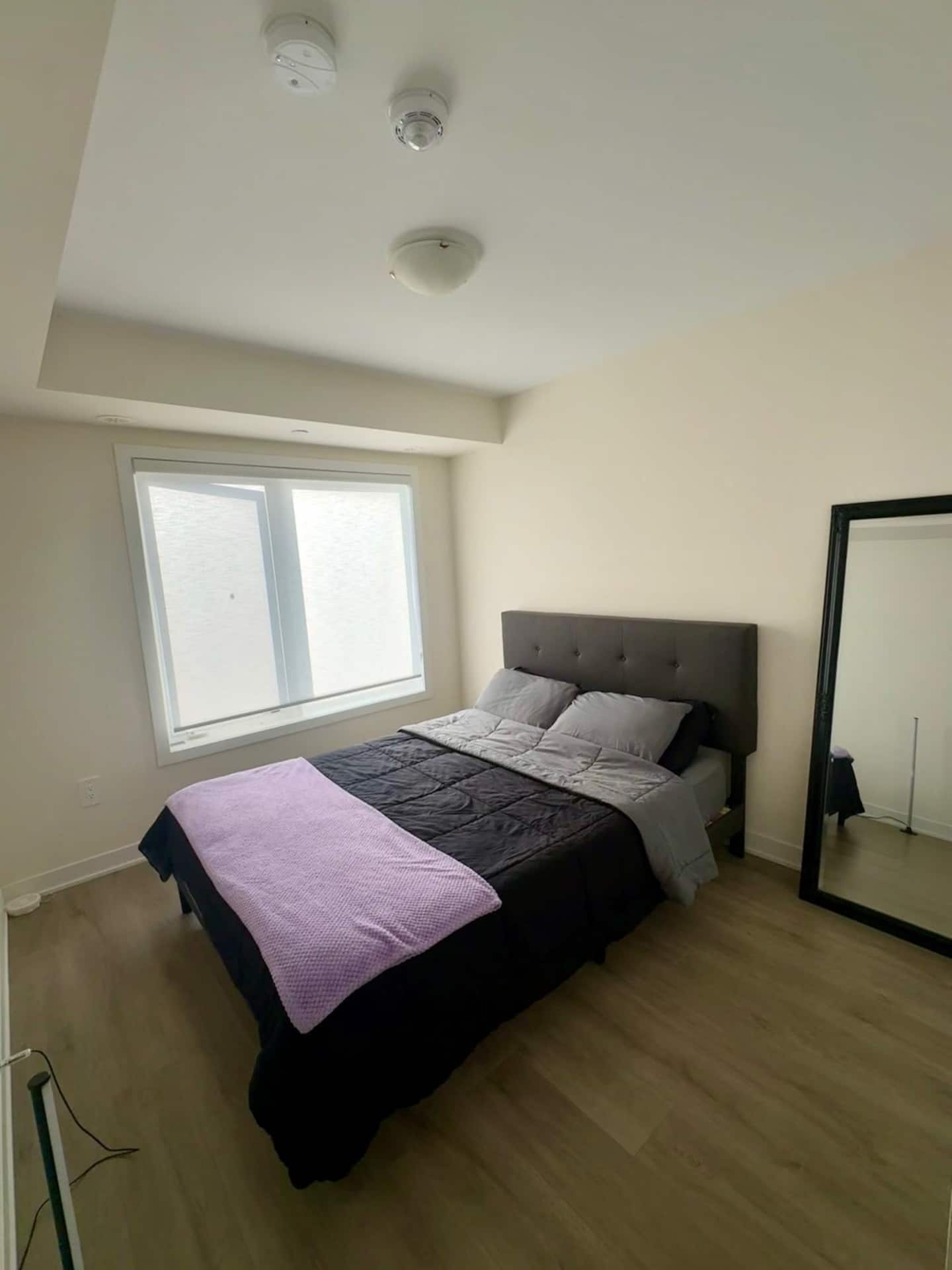 Actual furnished bedroom at Tucked Away Oasis